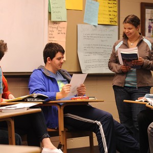 A group of Hesston College students discusses concepts in their Positive Psychology class.
