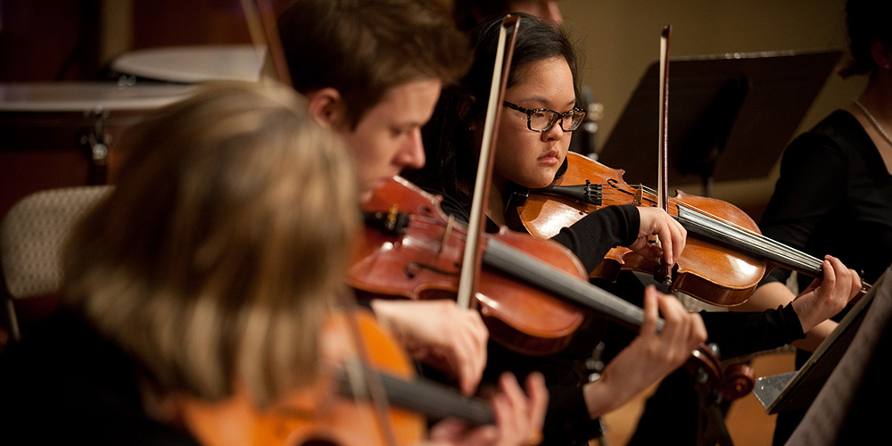 Freshman Quinn Kathrineberg performs as part of Hesston College’s string ensemble.