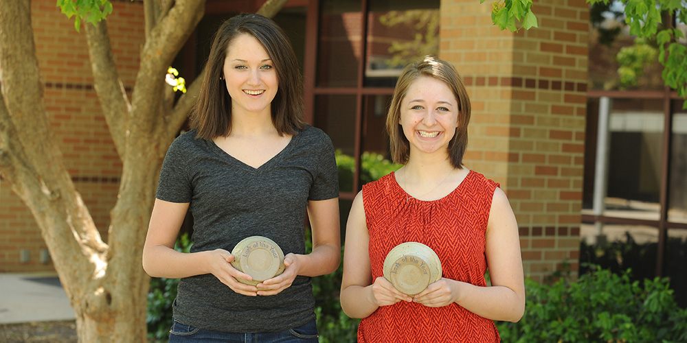 Hesston College sophomores Hannah Weaver (left) and Rebecca Eichelberger (right) were named Larks of the Year during the annual LarkFest Awards ceremony May 2.