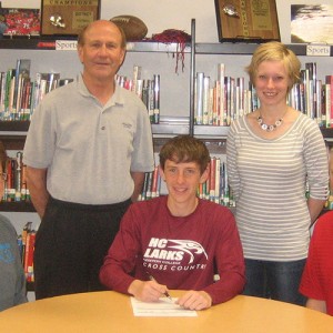 Jared Hague signs to run cross country for Hesston College.