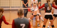 Hesston College volleyball action photo - Kymee Noll
