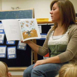 Morgan Martin reads to students at Hesston College Preschool