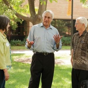 Sadi Othman (center) visits with Ken Rodgers, Margie Wiens, Dave Osborne and Ernst Wiens.