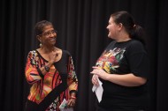 Egla Birmingham Hassan works with a student in a theatre master class.