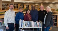 Hesston College alumni Bruce and Joy Rogers, right, donated 65 books on civil rights and African-American history to the college’s library. Pictured with the Rogers, from left, are history instructor John Sharp, librarians Margaret Wiebe and Donna Diener and sociology instructor Tony Brown. Rogers will co-lead a spring break trip commemorating the 50th anniversary of the civil rights march from Montgomery to Selma, Ala., in March with Brown and Sharp. 