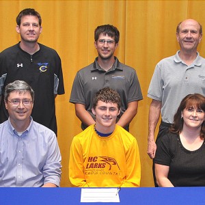 Weston Schroeder signs to run cross country for Hesston College.