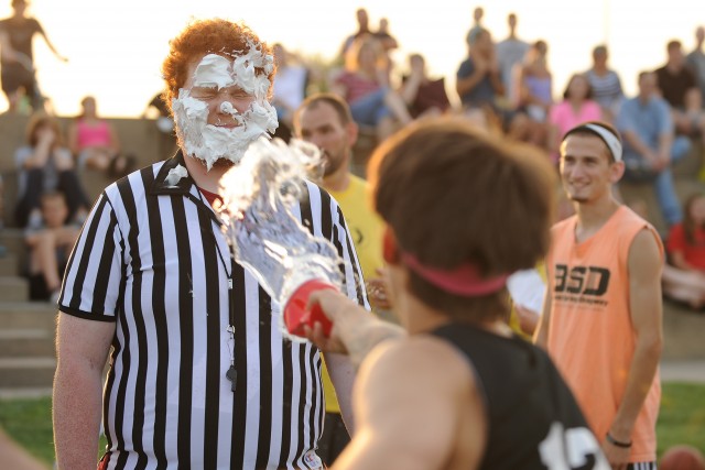 Resident Assistant Brady Bilderback (Boise, Idaho) braces for a face full of water as his mod mates try to "clean your RA" during the annual Sunday evening Mod Olympics. 