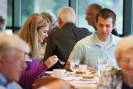 Cory Rychener ’10 and Kelsey Gardiepy enjoy lunch at the annual Partner Luncheon where Austin Mitchell ’15 and Grant Walker ’15 shared their Hesston Experience story. Mitchell and Walker became friends as members of the men’s basketball team and are now roommates and playing basketball at Bethel College (North Newton, Kan.).