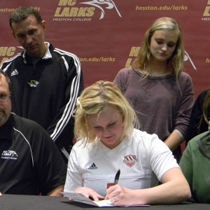 Paige Baucom signs a letter of intent to play soccer at Hesston College