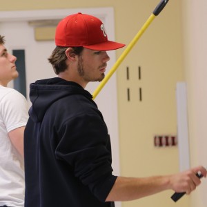Students Weston Schroeder (Harper, Kan.) and Daulton Horton (Denton, Texas), paint at the Mennonite Central Committee Central States office (North Newton, Kan.) as part of their Larkfest service project. All on-campus students participated, with about 275 students at 35 service assignments.