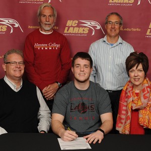 Garrett Roth signs to play tennis for Hesston College.