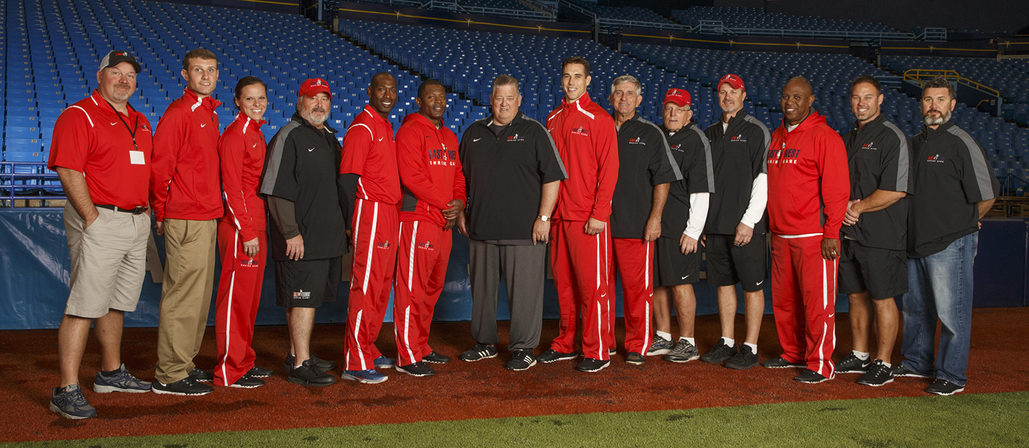 Katie Sowers (third from left) with the rest of the coaching staff at the East-West Shrine game in January. Sowers coached with high-profile football coaches and former players including Charlie Weis, Bill Muir and Brady Quinn. Photo by Matt May