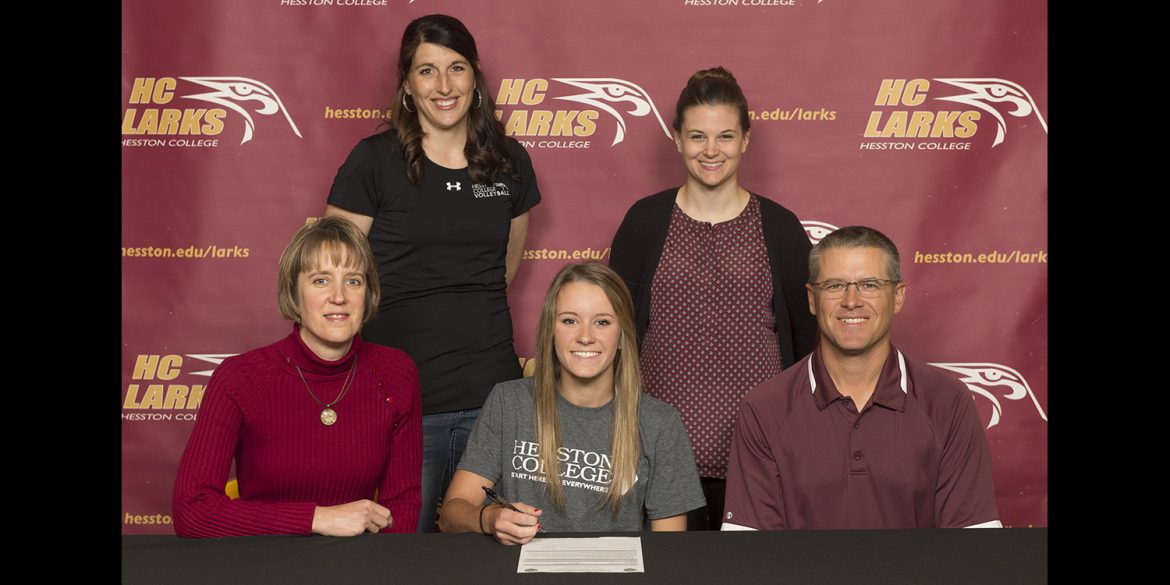 Kylie Brenneman signs a letter of intent to play volleyball for Hesston College.