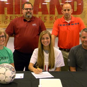 Lindsey Yoder signs a letter of intent to play soccer at Hesston College.