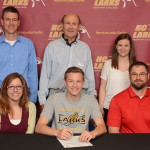 Luccas Schmucker signs to run cross country for Hesston College.