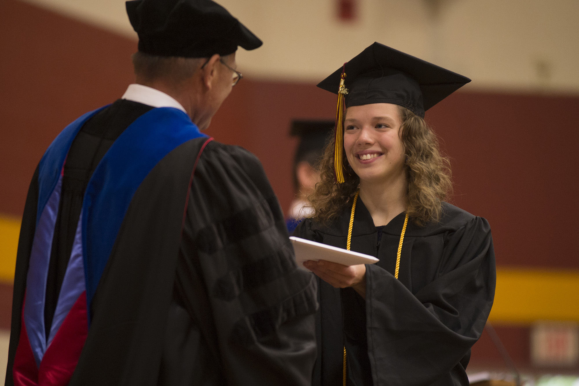 Shelby Miller ’16 (Archbold, Ohio) receives her diploma from President Howard Keim.