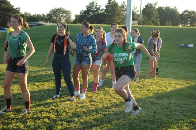 Freshman Nicole Loewen (Hutchinson, Kan.) sprints back to the front of the line in a relay race during Sunday evening Mod Olympics, Aug. 21. 