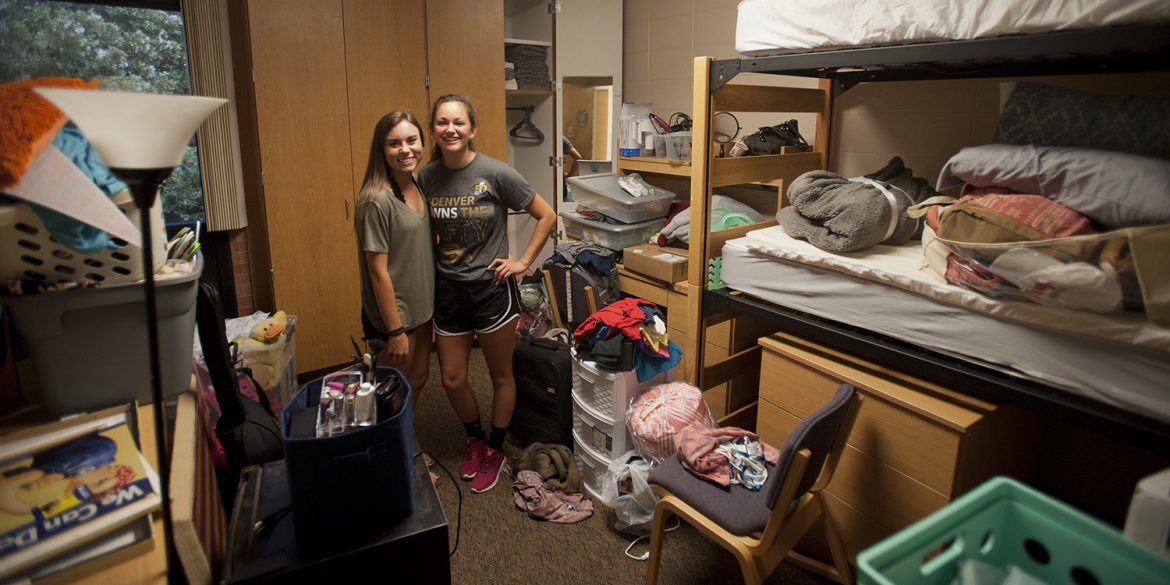 Freshmen Kendall Richardson (Lodi, Calif.) and Jasmine Pankratz (Abbyville, Kan.) take their first roommate picture shortly after moving into their dorm room Aug. 19.