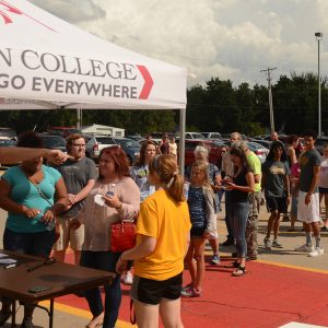 Students and families line up to check in to their residence hall at Hesston College's Opening Weekend 2016.