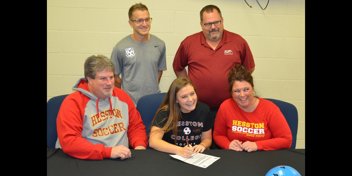 Morgan Lantz signs a letter of intent to play women's soccer at Hesston College.