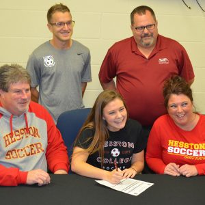 Morgan Lantz signs a letter of intent to play women's soccer at Hesston College.