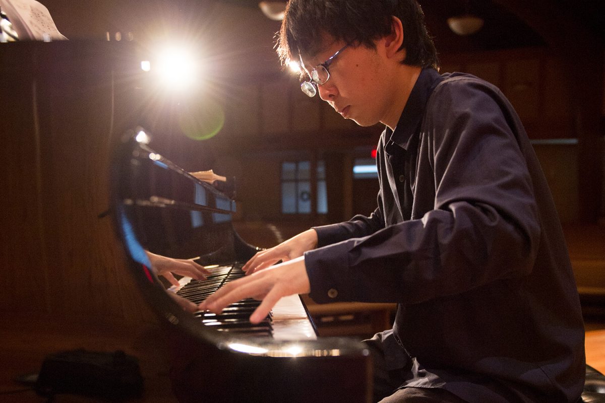 Masataka Miyake practices piano