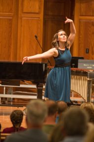 Talashia (Keim) ’02 Keim Yoder performs a dance at the gala concert, The Promise of Living, featuring Hesston College and Hesston High School music ensembles as well as dual alumni.