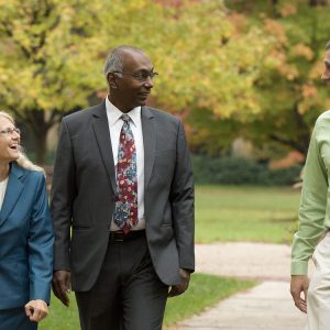 Joe and Wanda (Wyse) ’88 Manickam with Mark Landes, vice president of Finance and Auxiliary Services, during the Manickam's campus visit in November.