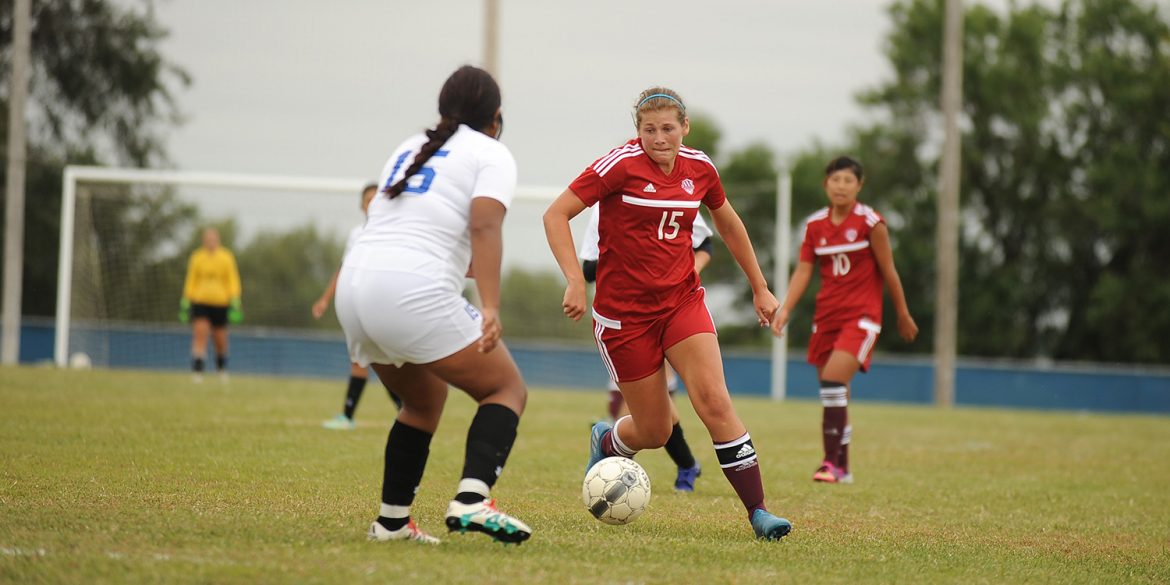 Allison Ebersole ’17 faces a defender. Ebersole broke the college's career scoring record just past the halfway point of the fall season.