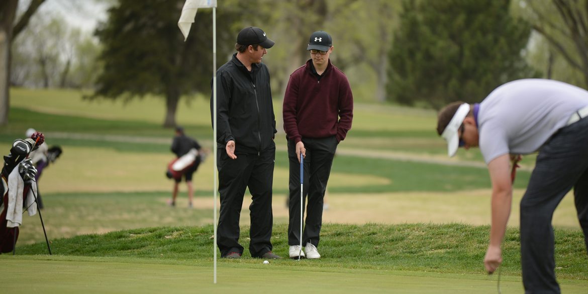 Hesston College golf action photo