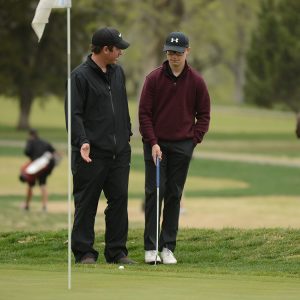 Hesston College golf action photo