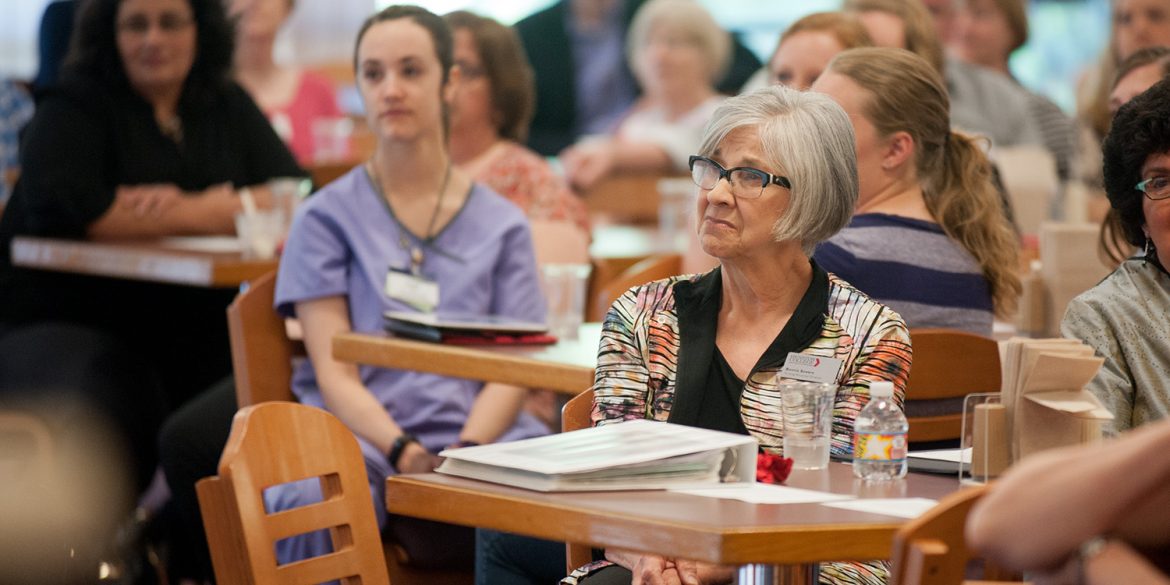 Bonnie Sowers listens to tributes at a reception in her honor.