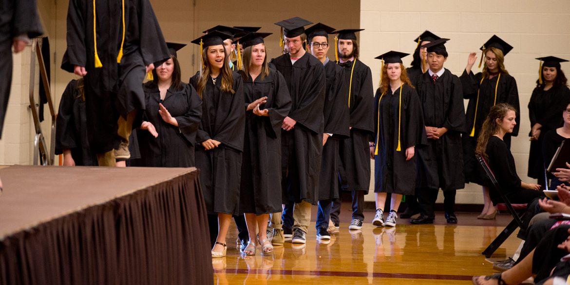 Graduates of the class of 2017 wait to receive their diplomas at Commencement.