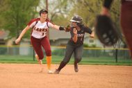 HC softball shortstop Sierrah Long tags a Ft. Scott baserunner.