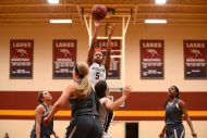 HC women's basketball player Whitney Green elevates for a shot.