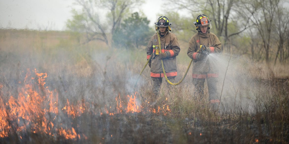 Hesston College EMS-fire students assist with a controlled burn