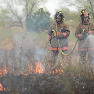 Hesston College EMS-fire students assist with a controlled burn