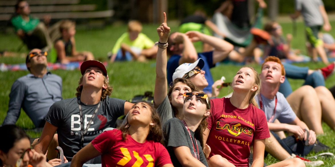 Hesston College students view the totality of the solar eclipse.