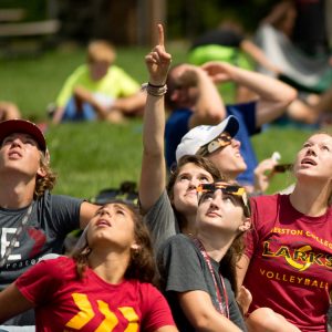 Hesston College students view the totality of the solar eclipse.