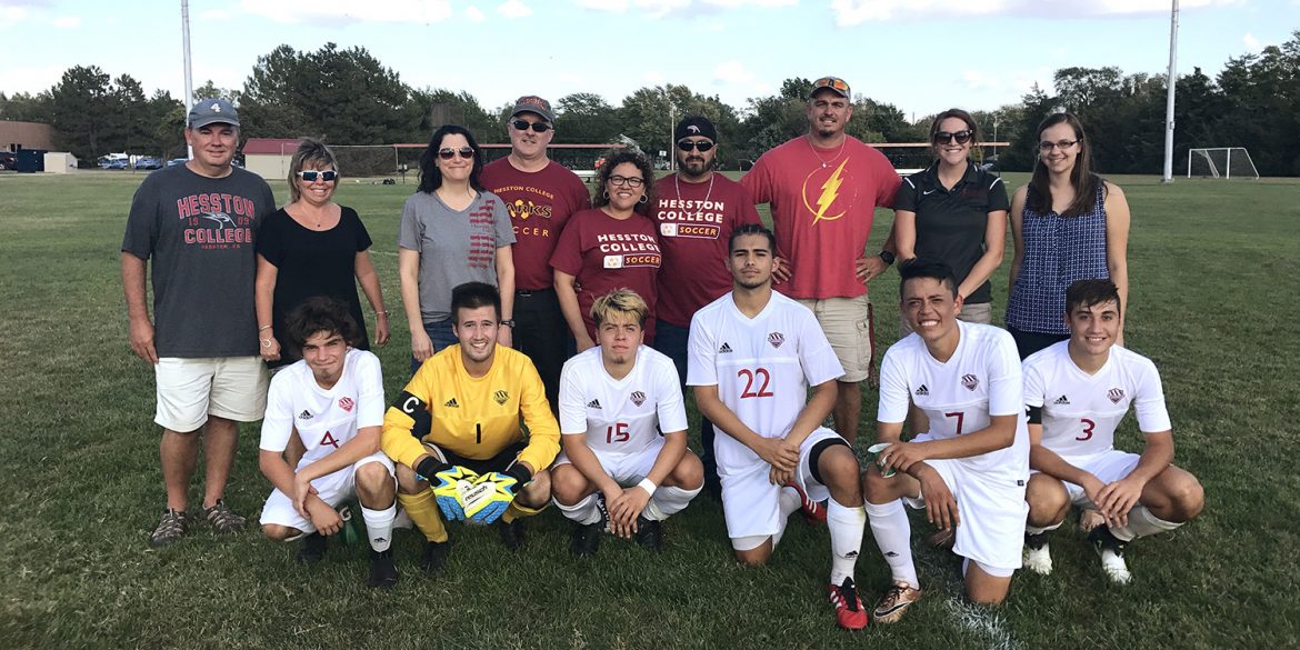 HC men's soccer sophomores pose with parents on sophomore night