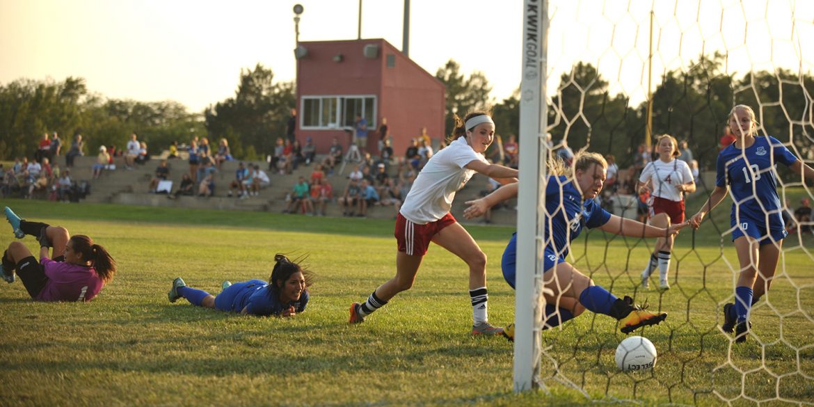 Hesston College women's soccer player Kenzie Johnson scores in a September 9, 2017 match with Pratt Community College.