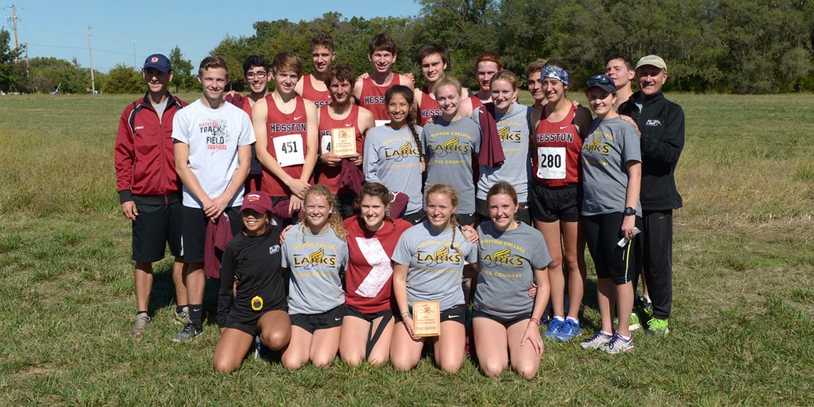 Hesston College men's and women's cross country teams display their team champions plaques after the Bethel Invitational meet, Oct. 7, 2017