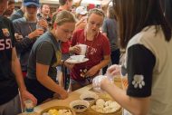 Students sample ethnic Japanese food at the Cultures Fair in September.