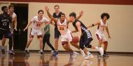 Hesston College men's basketball action photo - Aubrey Johnson