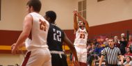 Hesston College men's basketball action photo - Aubrey Johnson