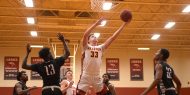 Hesston College men's basketball action photo - Zac Neely