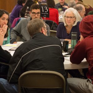 AVDS participants discuss strategies for changing systemic oppression and injustice in Saturday small group Change Agent sessions.