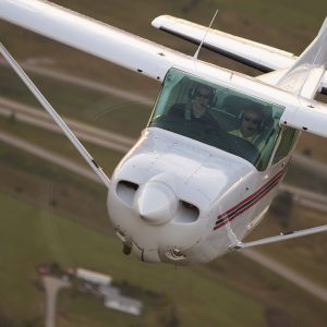 Hesston College plane in flight