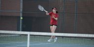 Hesston College women's tennis action photo