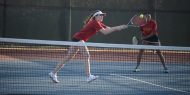 Hesston College women's tennis action photo